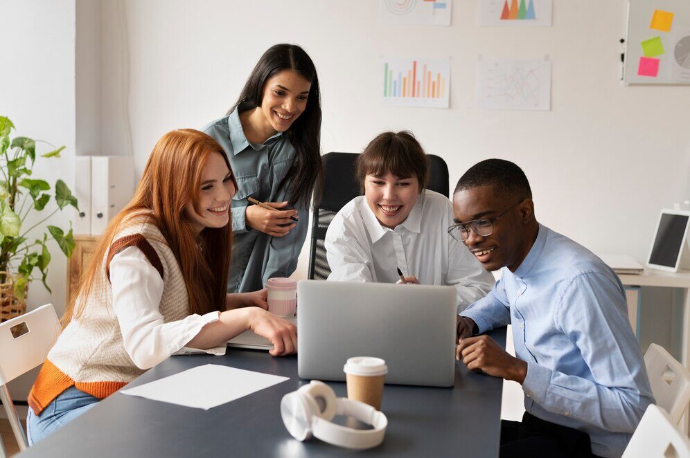 people-practicing-social-integration-workspace_23-2149405409